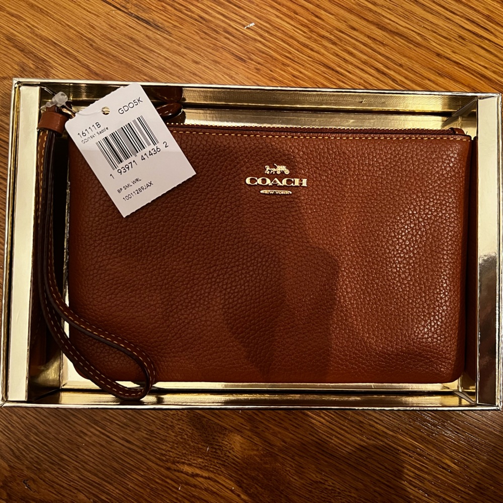 New in box Coach Sadie Wristlet Tan